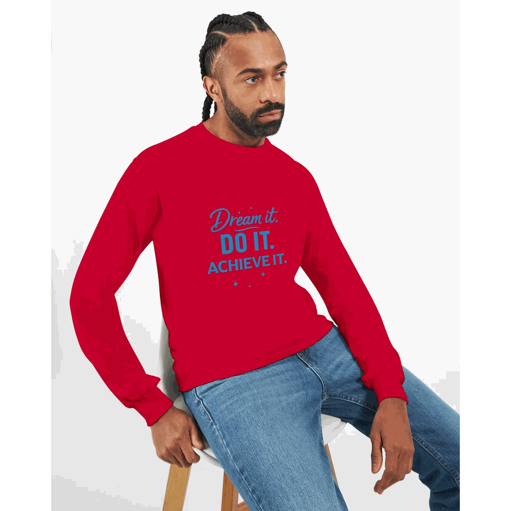 Man wearing red unisex long sleeve shirt with blue "Dream it. DO IT. ACHIEVE IT." motivational text.