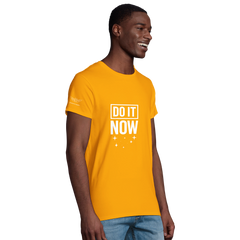 Organic men's fitted t-shirt in orange with "DO IT NOW" motivational print