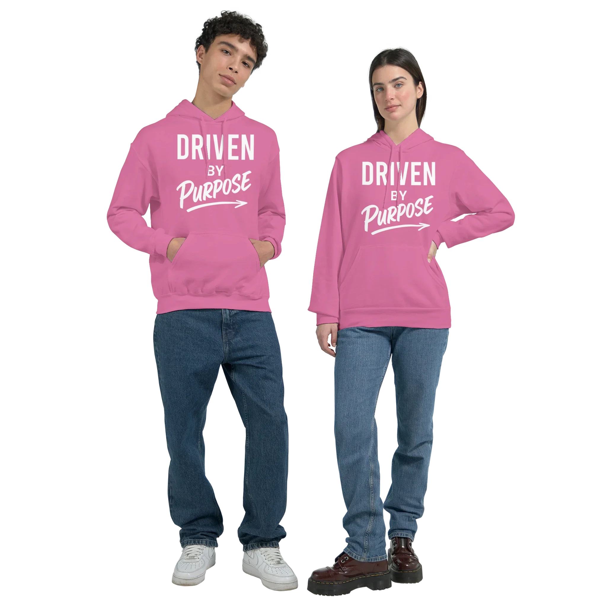 Motivational Classic Unisex Pullover Hoodie in pink with "Driven by Purpose" text, soft cotton-poly blend, front pouch pocket, and ribbed cuffs.