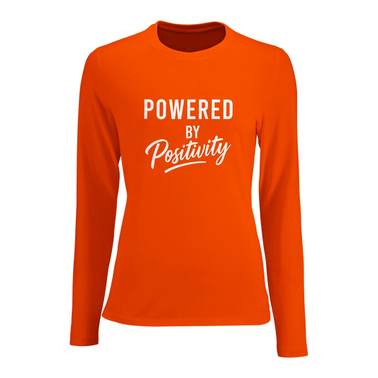 Women's fitted long sleeve t-shirt in orange with "Powered by Positivity" motivational text design