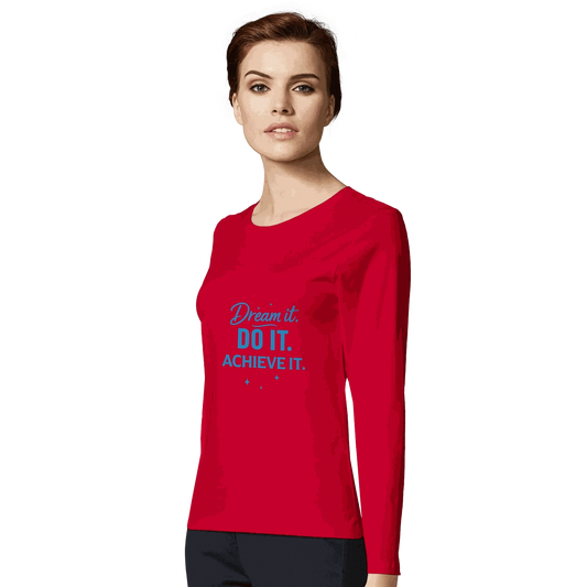 Woman wearing a red fitted women's motivational long sleeve t-shirt with "Dream it. DO IT. ACHIEVE IT." text on the front