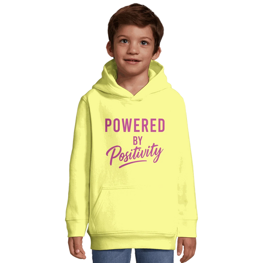 Child wearing a yellow motivational recycled blend kids hoodie with "Powered by Positivity" text