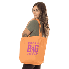 Organic Dream BIG Tote Bag with long handles and motivational quote "Dream BIG Go Far" in orange color
