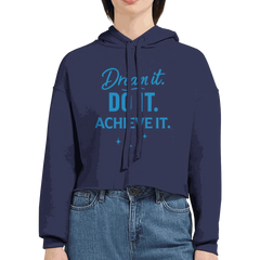 Womens cropped navy hoodie with "Dream it. DO IT. Achieve it." motivational text and raw hem design