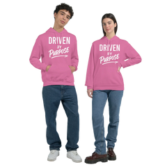 Motivational Classic Unisex Pullover Hoodie in pink with "Driven by Purpose" text, soft cotton-poly blend, front pouch pocket, and ribbed cuffs.