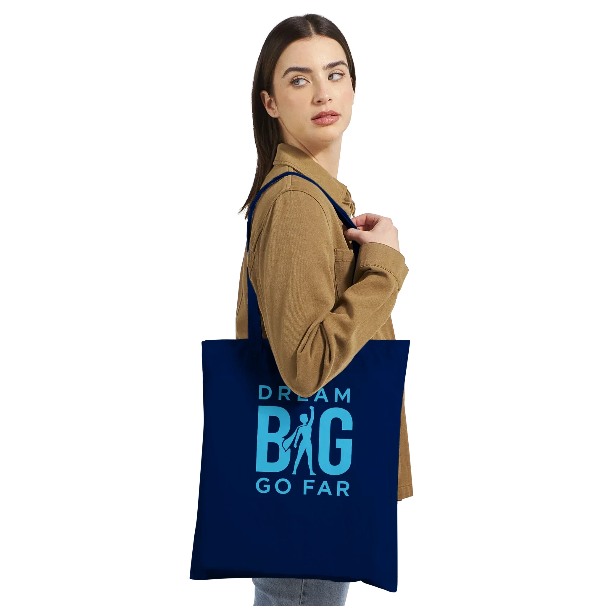 Woman carrying navy blue Dream BIG tote bag with motivational text and silhouette design