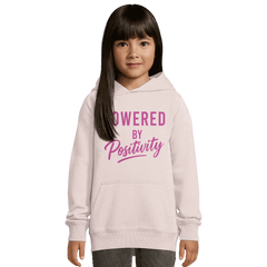 Girl wearing a motivational organic kids hoodie with "Powered by Positivity" text in pink letters