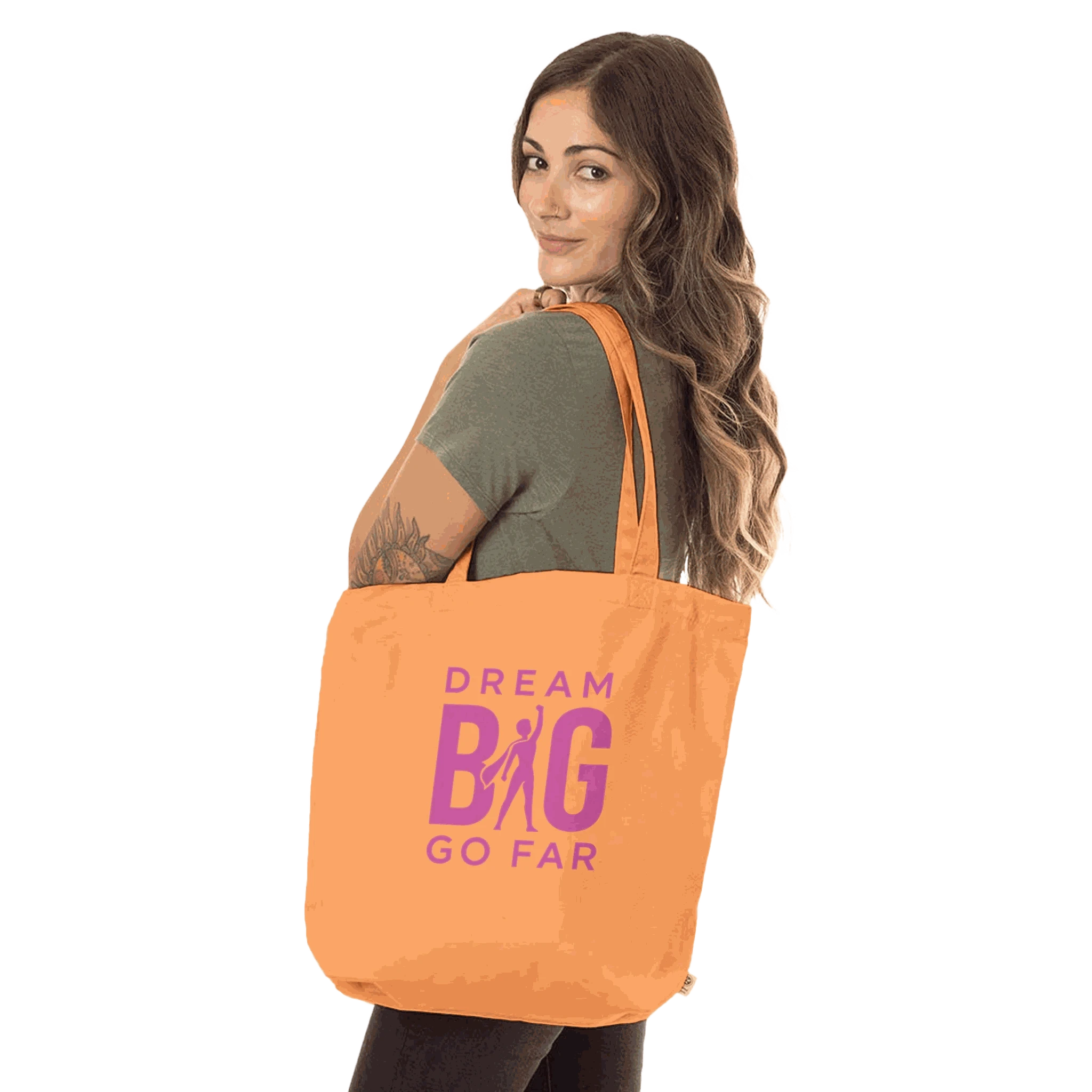 Organic Dream BIG Tote Bag with long handles and motivational quote "Dream BIG Go Far" in orange color